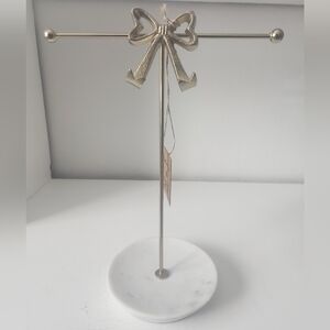 Gold Bow Jewelry Organizer Or Hand Towel Holder With White Marble Base